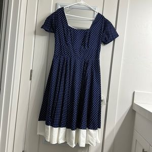Large navy blue polka dot dress